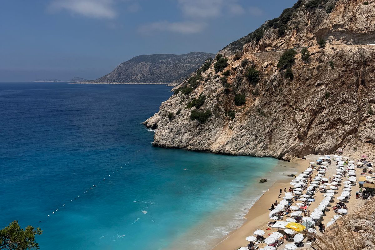 The turquoise cove of Kaputaş beach at the foot of a gorge